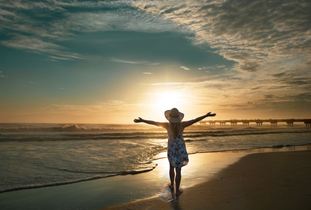 Woman enjoying sunrise